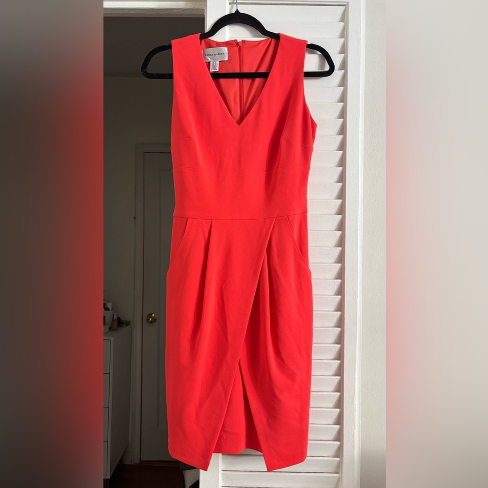 Donna Morgan coral orange sleeveless dress. Petal style design, back zip, lined.